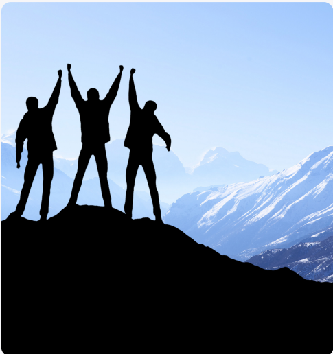 Team on mountain peak